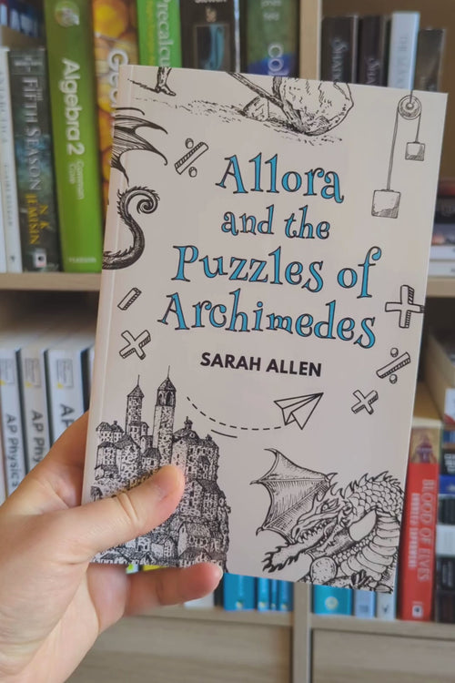 a hand holding the paperback of Allora and the Puzzles of Archimedes in front of a bookshelf rotates it so you can see the spine is about a centimeter thick