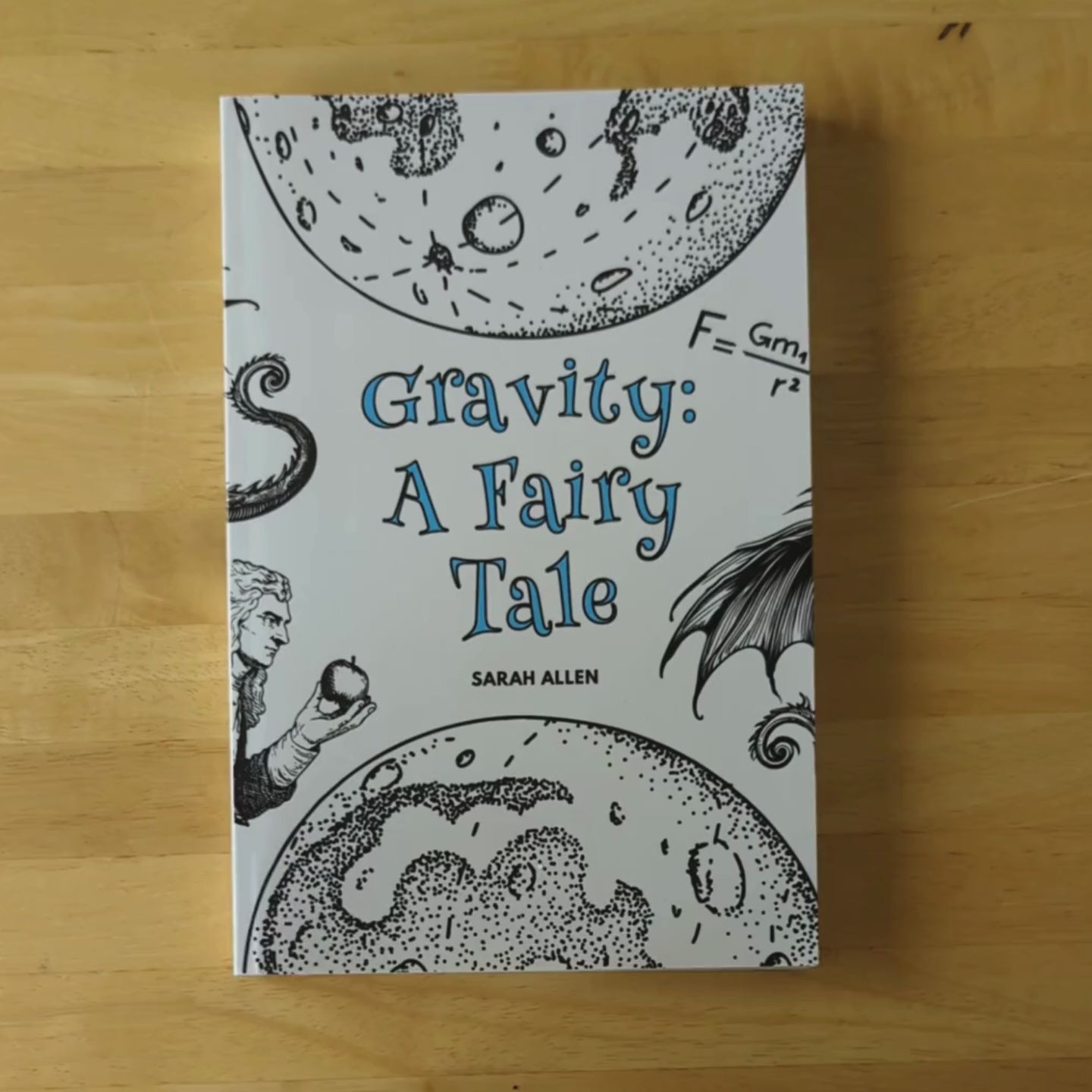 a video of hands flipping through the gravity fairy tale paperback. it's mostly text but has several full color illustrations