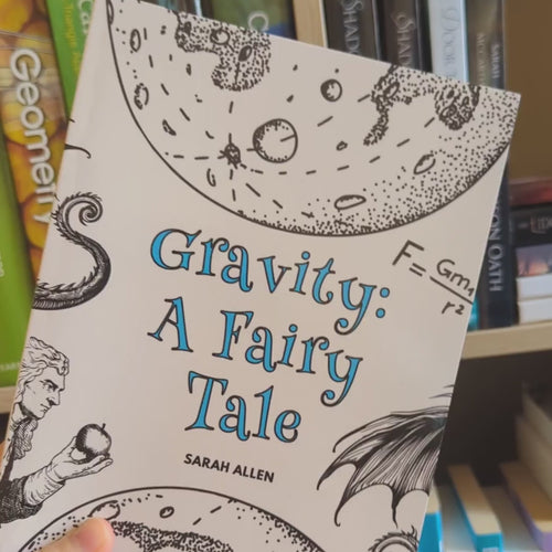 a video of the gravity paperback rotating in front of a bookshelf. the spine is about half an inch thick